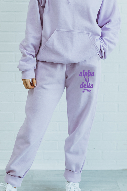 Purple with Purple Text sweatpants - Alpha Xi Delta