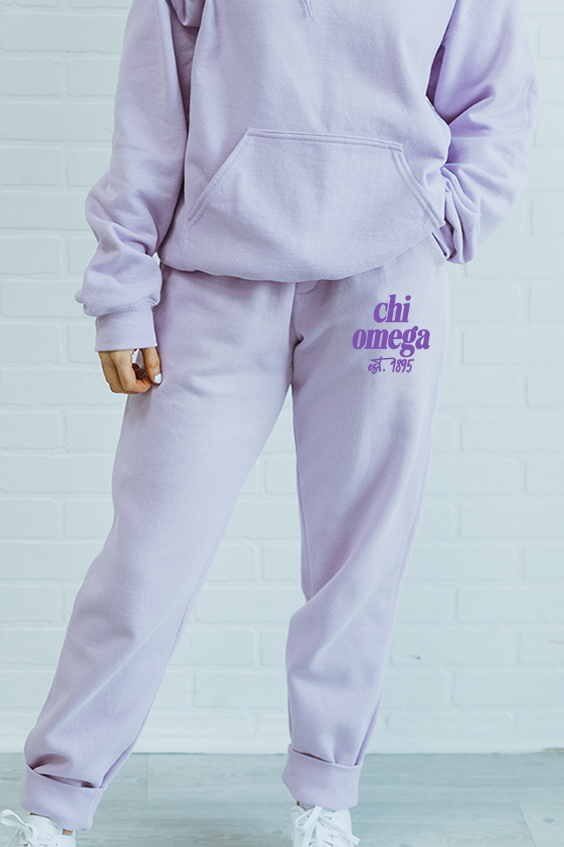 Purple with Purple Text sweatpants - Chi Omega