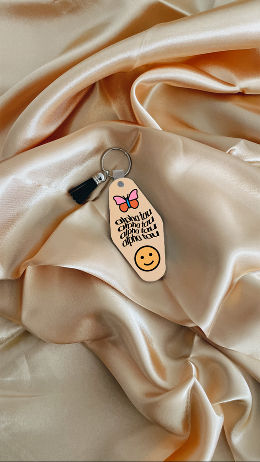 Smiley keychain - Alpha Tau