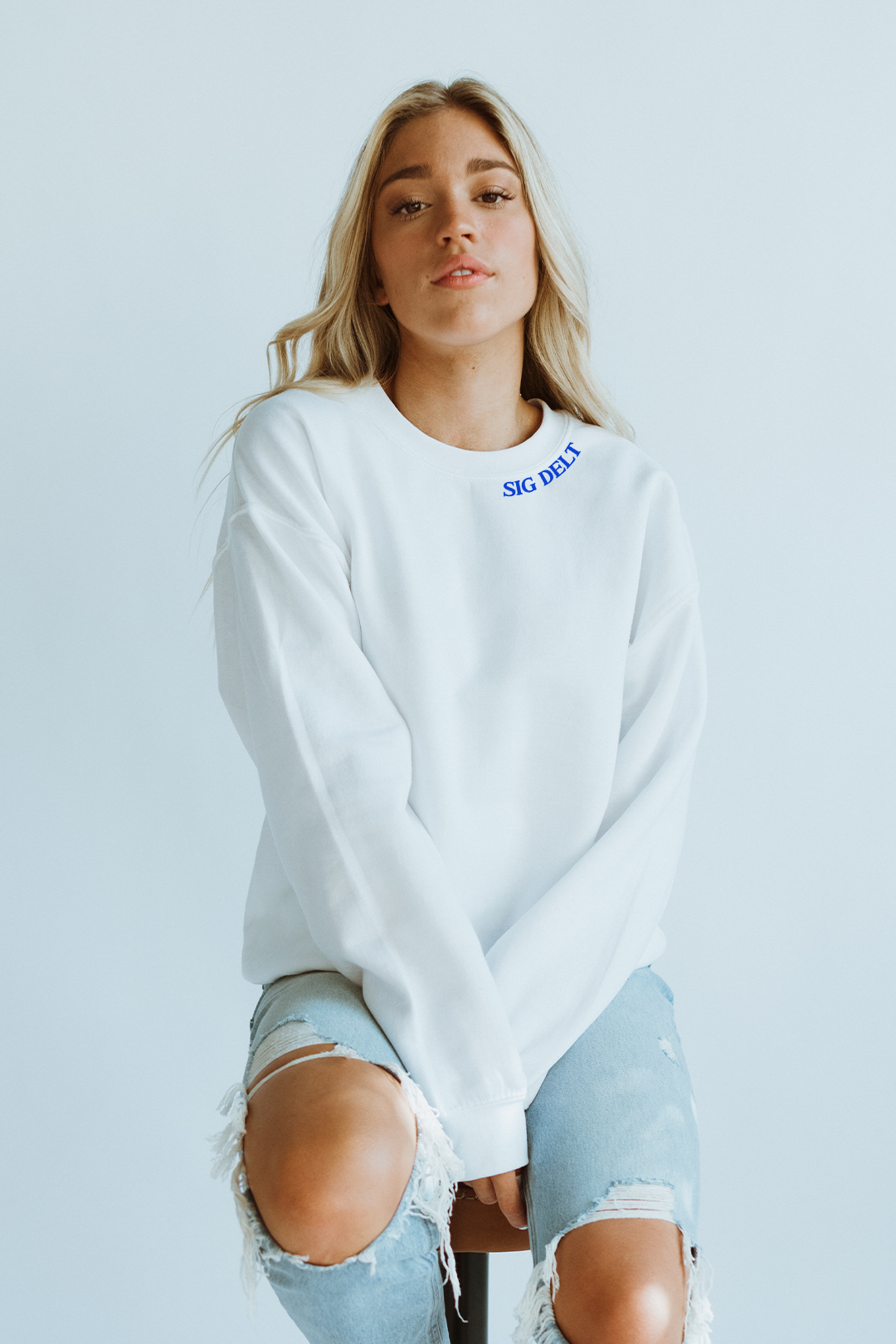 White sweatshirt with Blue Collar text - Sig Delt